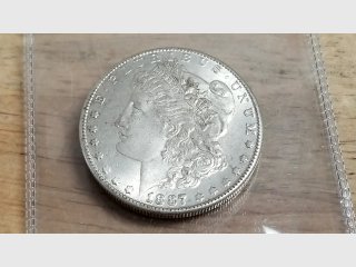 1887 O Morgan Silver Dollar
