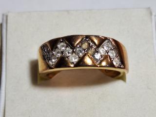 Costume ring, plated size 7.5, couple stones missing