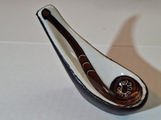 Porcelain, leather pipe holder
