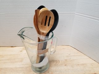 Pitcher with spoons