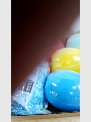 Assorted Plastic Eggs 6 inch containers and grass