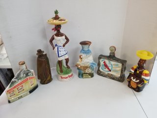 Empty decanters, tallest approx 20 inch