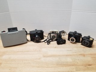 Vintage cameras, due to age sell as is