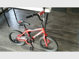 HUFFY kids bike 34 inch tall 42 inch long 