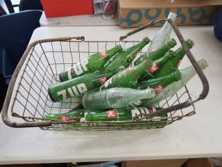 Old basket with pop bottles 