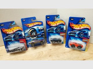Lot of 4 Hot Wheels Cars in Packages