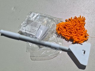 Telescopic multipurpose triangular cleaner with pads