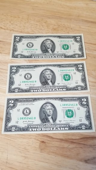 Three $2 Bills, consecutive Serial numbers