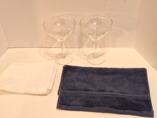 Pair of margaritas glasses,  towels