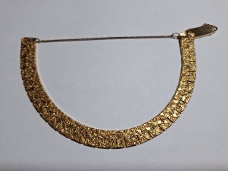 Gold plated 7 inch bracelet with safety chain