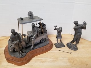 Golf decor, extremely heavy, signed and numbered, missing one golf club