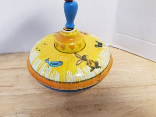 Vintage top, works great, approx 7.5 inch, ohio art USA