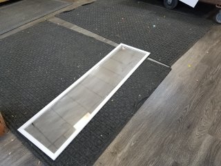 New door mirror approx 50 by 14 inches 