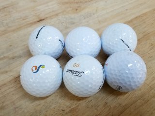 6 Titleist Velocity Golf balls, good con
