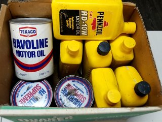 Motor oil cans and bottles, unopened