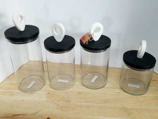 New Four Glass Storage Jars with Lids, Tallest is 12 in