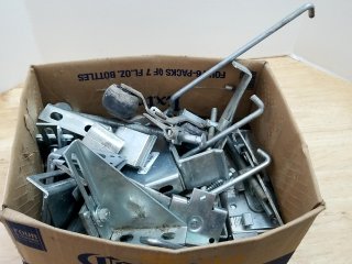 Box of metal brackets and hardware