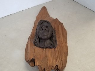 COMPOSITE face on wood decor, 20 inch