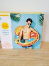 Item #596 — New citrus swim tube
