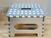 Item #138 — Gray Folding Step Stool, 12 in