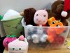 Item #132 — Assorted plush toys in clear bin