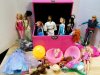 Item #143 — Pink Doll Trunk with Assorted Dolls