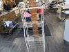 Item #143 — Metal stand 64 by 24 inch