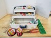 Item #70 — Tackle box with fishing tackle, fishing line