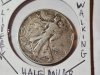 Item #100 — 1942-P silver Walking Liberty half dollar