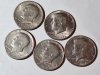 Item #106 — 5 Kennedy half dollars
