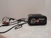 Item #182 — Black Battery Charger with Cables