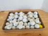 Item #75 — Golf balls