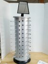 Item #179 — New Rotating display,  32 in