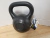 Item #243 — New 5lb kettle bell