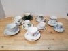 Item #137 — Teacups and saucers, great shape