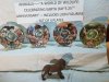 Item #227 — Collectible plate set, mint in boxes, and lion figure