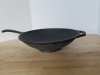 Item #70 — Cast iron pan, approx 14 by 3.5 inch not including handle
