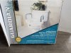 Item #78 — LOCKING elevated toilet seat, never been used