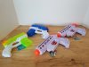 Item #160 — 4 new water guns