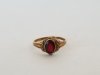 Item #139 — Antique Gold Child ring with red stone, size 2.5