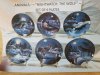 Item #122 — Collectible plate set, mint in boxes