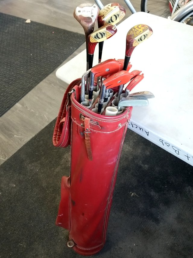 Item #302 — VINTAGE Red Leather Golf Club Bag and clubs photo 1 of 3