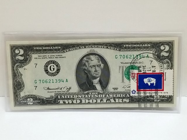 Item #77 — 1976 $2 Chicago, Unc, 1st day Issue stamped Wyoming photo 1 of 6