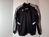Item #511 — Adidas ladies clothing, size medium photo 1 of 4