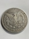 Item #83 — 1884 Morgan Silver Dollar photo 2 of 2