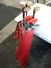 Item #302 — VINTAGE Red Leather Golf Club Bag and clubs photo 1 of 3