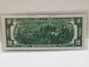 Item #77 — 1976 $2 Chicago, Unc, 1st day Issue stamped Wyoming photo 2 of 6