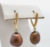 Item #29 — Marked 14 kt gold brown pearl earrings photo 1 of 3