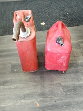 Item #326 — PAIR of gas cans, tallest approx 20 inch