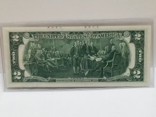 Item #77 — 1976 $2 Chicago, Unc, 1st day Issue stamped Wyoming photo 2 of 6